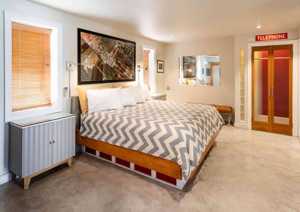 superman suite king bed and phone booth