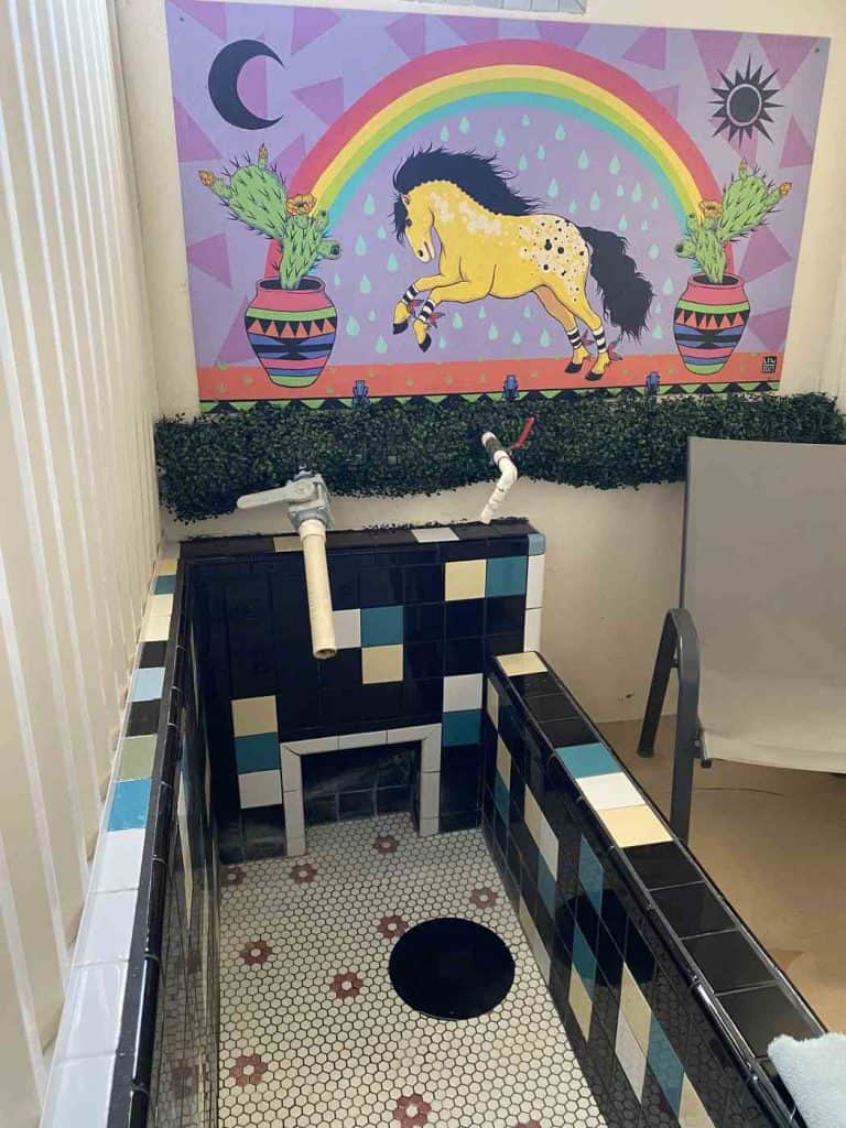 charles hot springs single bath with pony mural