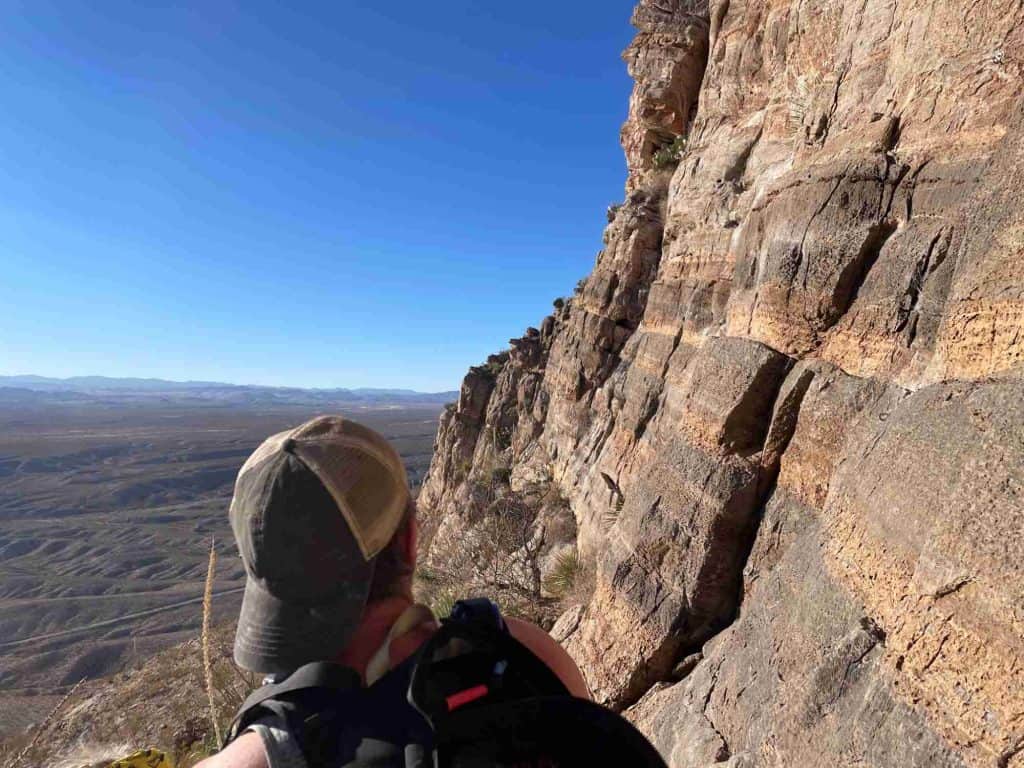 rock climber viewing the vacation wall at mud mountain sierra county nm