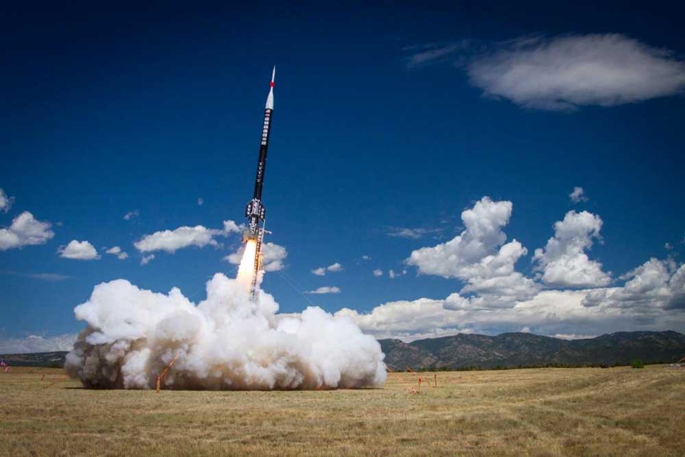 rocket blasting off at the spaceport america cup