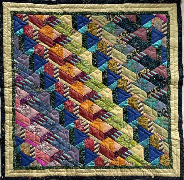 quilted wall piece by fiber artist rebecca speakes