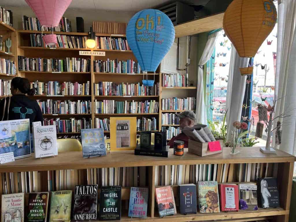 black cat books and balloons