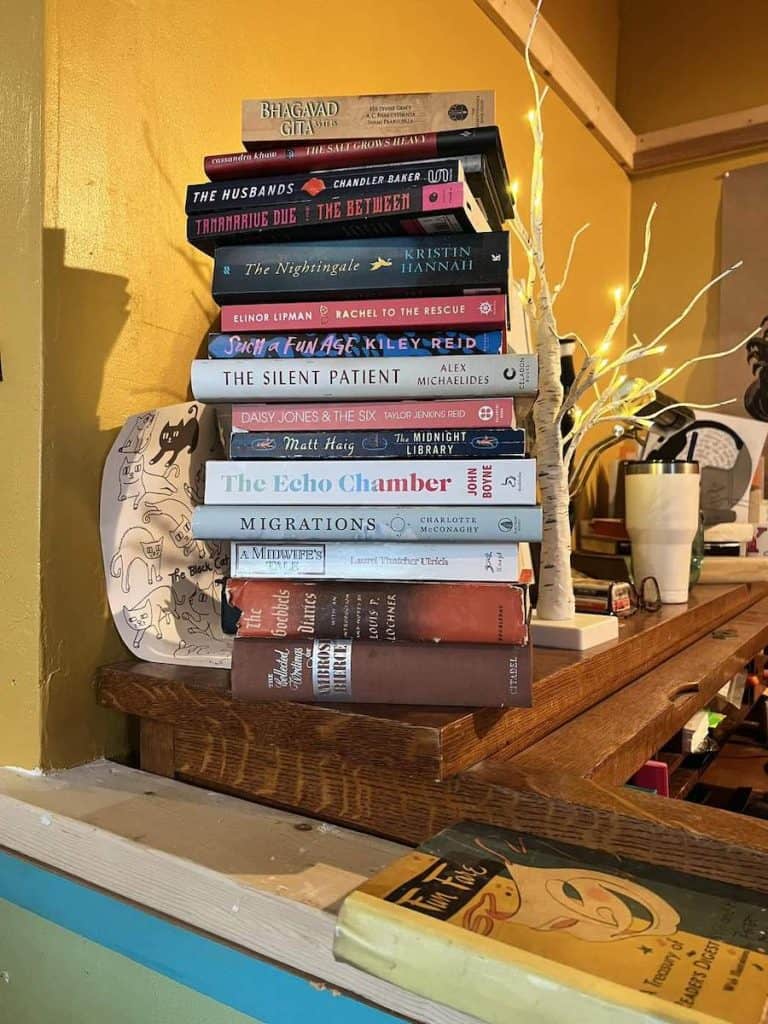 black cat books and coffee book stack