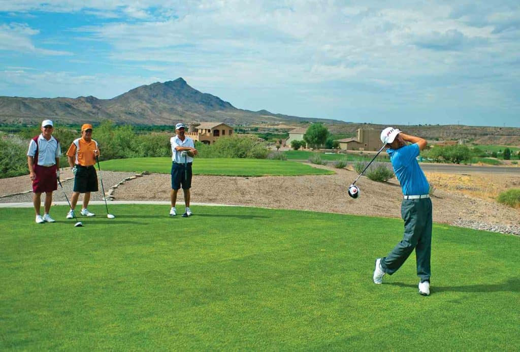 teeing off at turtleback mountain golf and resort