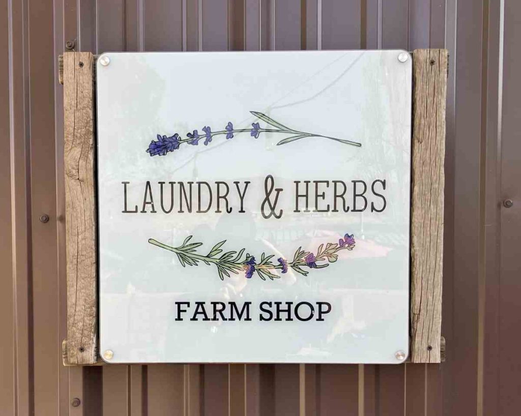 laundry and herbs sign