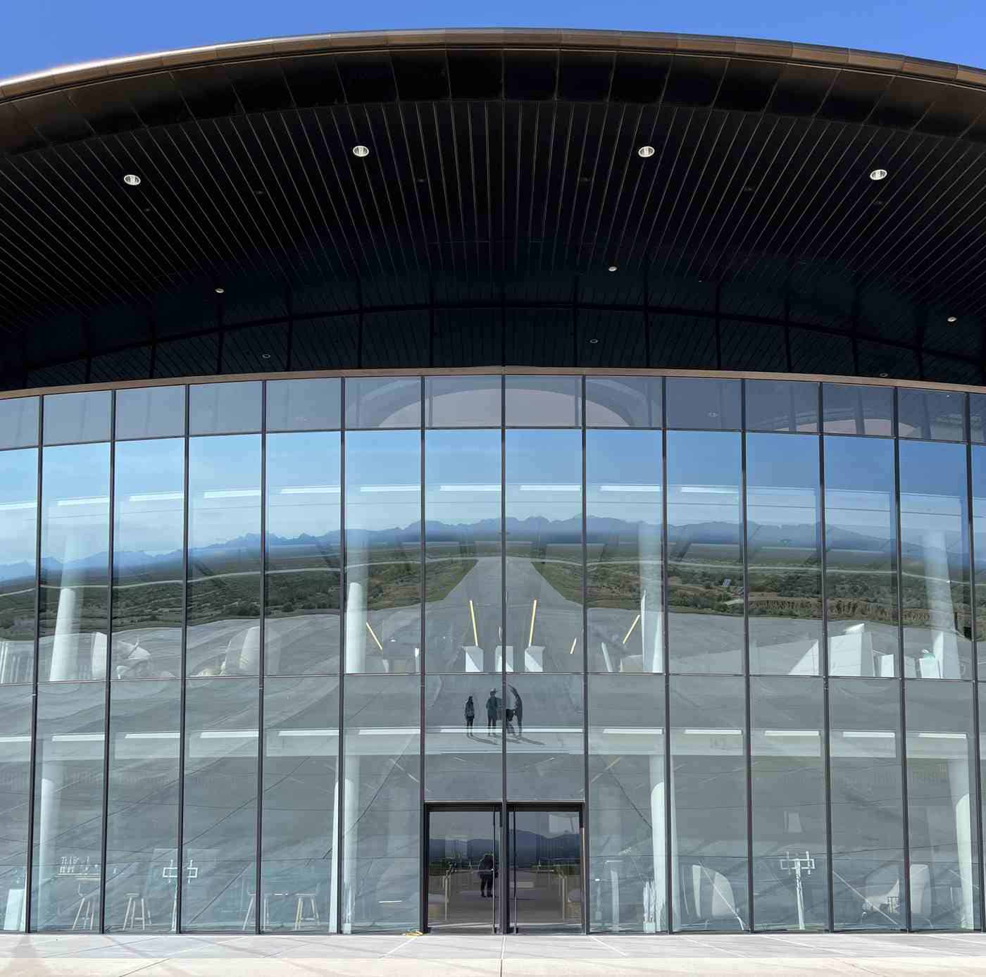 spaceport open house reflection in the gateway to space windows